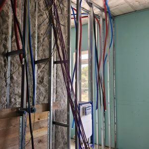 Plasterboard installation, partitions, ceilings, and joint treatment.